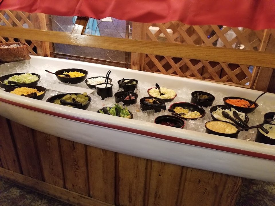 Printed menu featuring fish, shrimp, and chicken.
